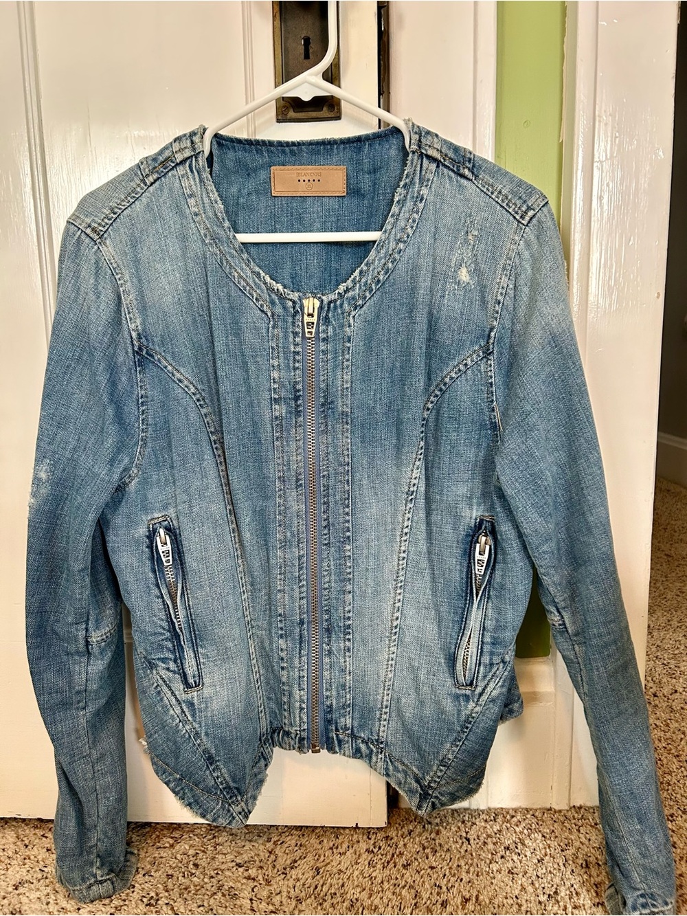 Anthropologie Blue Denim Zip-Front Women's Jacket with peplum.